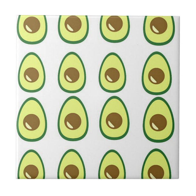 Sliced green avocado on white tile (Front)