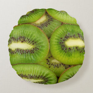 Slices of fresh and ripe kiwi fruit in rowsbrown,c round cushion