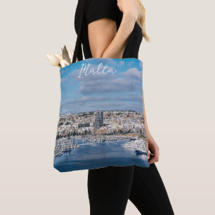 Sliema harbour with modern buildings and boats tote bag
