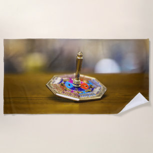 SlipperyJoe Hanukkah dreidel gift octagonal base b Beach Towel