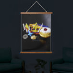 SlipperyJoe Hanukkah symbolic still life holiday e Hanging Tapestry<br><div class="desc">SlipperyJoe Hanukkah symbolic still life holiday essence vibrant meaningful objects colourful slender pile menorah candles artistic red blue yellow and white sufganiyah doughnut classic jelly-filled commemorate miracle of the oil dreidels metallic gold glossy blue Hebrew great miracle happened there metallic pewter star of David medallion light resilience community themes spiritual...</div>