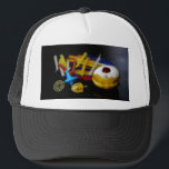 SlipperyJoe Hanukkah symbolic still life holiday e Trucker Hat<br><div class="desc">SlipperyJoe Hanukkah symbolic still life holiday essence vibrant meaningful objects colourful slender pile menorah candles artistic red blue yellow and white sufganiyah doughnut classic jelly-filled commemorate miracle of the oil dreidels metallic gold glossy blue Hebrew great miracle happened there metallic pewter star of David medallion light resilience community themes spiritual...</div>