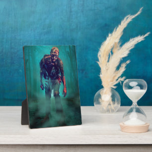 SlipperyJoe terrifying zombie figure isolated omin Plaque