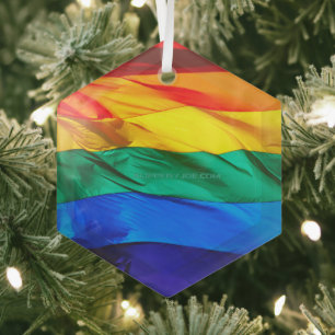 SlipperyJoe's gay pride flag waving pride colours  Glass Tree Decoration