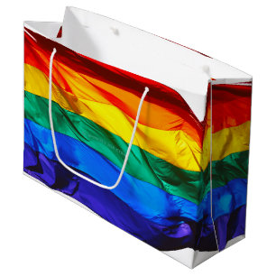 SlipperyJoe's gay pride flag waving red orange yel Large Gift Bag