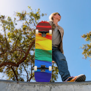 SlipperyJoe's gay pride flag waving red orange yel Skateboard