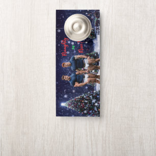 SlipperyJoe's glowing Christmas trees two muscular Door Hanger