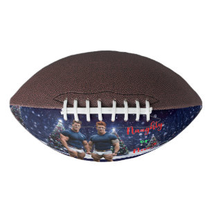 SlipperyJoe's glowing Christmas trees two muscular Football
