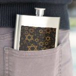 SlipperyJoe's Hanukkah-themed Star David artistic  Hip Flask<br><div class="desc">SlipperyJoe's Hanukkah-themed Star David artistic candlelight festive glow light and resilience themes modern reverent for Jewish holidays varying sizes metallic tones gold bronze deep brown rich black background evokes Hebrew tradition elegance symmetrical pattern gifts decorations rhythmic ceremonial visual flow significant symbol religion</div>