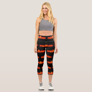 SlipperyJoe's Happy Halloween pumpkin glowing eyes Capri Leggings