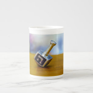 SlipperyJoe's Happy Hanukkah four-sided spinning t Bone China Mug