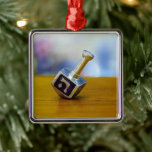 SlipperyJoe's Happy Hanukkah four-sided spinning t Metal Tree Decoration<br><div class="desc">SlipperyJoe's Happy Hanukkah four-sided spinning top dreidel artistic Celebration Candles Jewish Hebrew Chanukah gifts decorations Judaism religion Hebrew letter Nun traditional toy children adult game cultural symbol metallic shiny finish wooden surface</div>