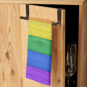 SlipperyJoe's Inclusive gay pride flag textured ru Tea Towel