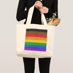 SlipperyJoe's inclusive gay pride flag wooden blac Large Tote Bag