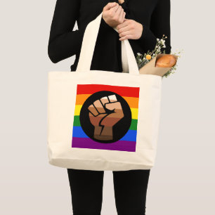 SlipperyJoe's queer people colour flag raised fist Large Tote Bag