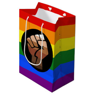 SlipperyJoe's queer people colour flag raised fist Medium Gift Bag