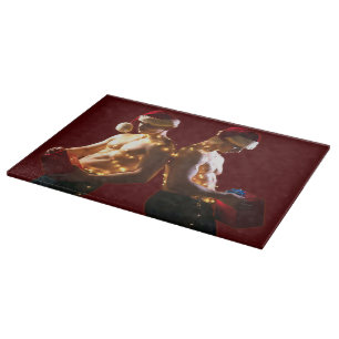 SlipperyJoe's shirtless men back-to-back Christmas Cutting Board