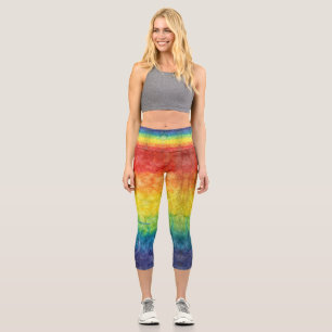 SlipperyJoe's tie-dyed flag rainbow pressed into s Capri Leggings