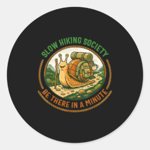 Slow hikers society be there in a minute snail classic round sticker