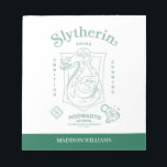 SLYTHERIN™ Pride Ambition Cunning Crest Notepad<br><div class="desc">Show your house pride with this bold Slytherin™ crest design, honoring the ambition and cunning that define this iconic Hogwarts™ house. Featuring the striking serpent coiled within a classic shield, the artwork highlights Slytherin’s core traits — Ambition, Pride, and Cunning — in a clean, vintage-inspired layout. Rendered in signature house...</div>