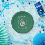 SLYTHERIN™ Pride Ambition Cunning Crest Paper Plate<br><div class="desc">Show your house pride with this bold Slytherin™ crest design, honoring the ambition and cunning that define this iconic Hogwarts™ house. Featuring the striking serpent coiled within a classic shield, the artwork highlights Slytherin’s core traits — Ambition, Pride, and Cunning — in a clean, vintage-inspired layout. Rendered in signature house...</div>