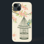 Small Birds Perched on a Branch and on a Birdcage iPhone 13 Case<br><div class="desc">Nancy Slocum's have painted many birds throughout the years. This image portrays two small blue and yellow birds perched on a branch surrounded by pink flowers and looking curious about a birdcage. Get this cool bird-themed art piece on your Zazzle product today.</div>