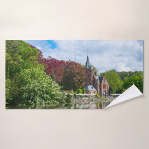 Small castle near lake in Bruges, Belgium Bath Towel