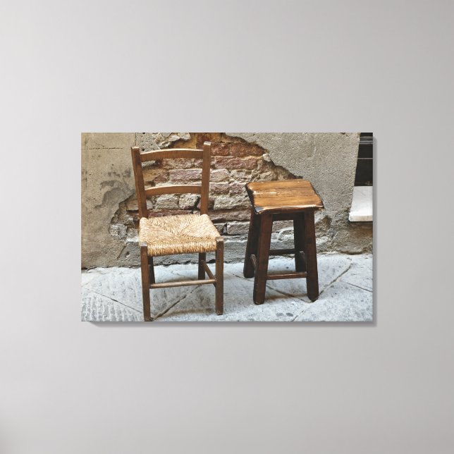 Small chair and stool, Pienza, Italy Canvas Print (Front)