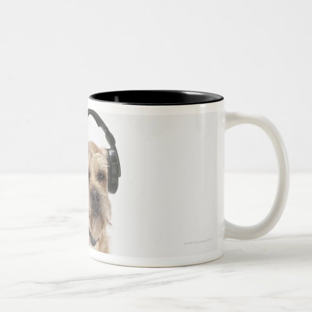 Small dog wearing headphones Two-Tone coffee mug (Right)