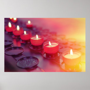 Small firing candles in catholic church poster