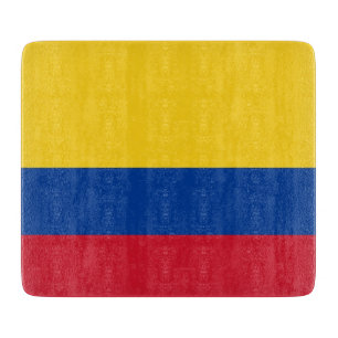 Small glass cutting board with flag of Colombia