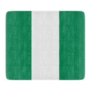 Small glass cutting board with flag of Nigeria
