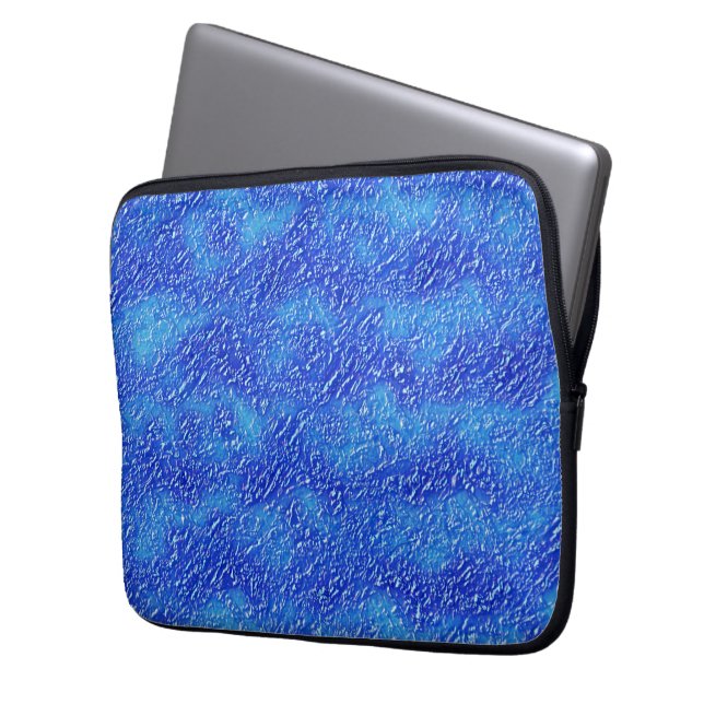 Small grooves texture on stained blue to clear hue laptop sleeve (Front Left)