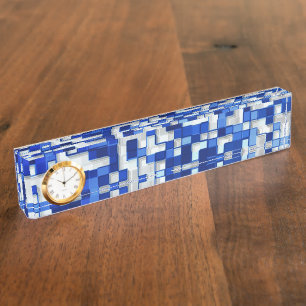 Small squares scattered, tones of blue with white nameplate