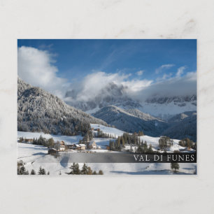 Small village with Dolomites mountains in the snow Postcard