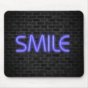 SMILE text in neon lights on brick Mouse Pad