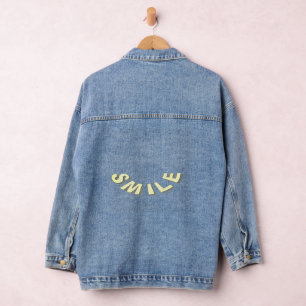 Smile text on denim jacket