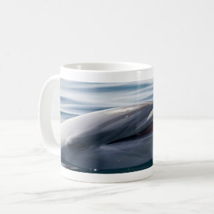 Smiling Dolphin Rising Above Bright Blue Water Coffee Mug