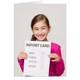 Smiling girl student proud of report card