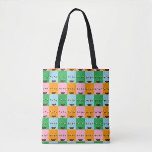 Smiling monster block faces tote bag