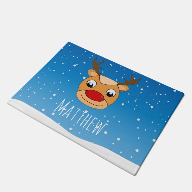 Smiling reindeer snowfall personalised blue doormat (Angled)