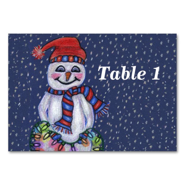 Smiling Snowman Holding String of Christmas Lights Table Number (Front)