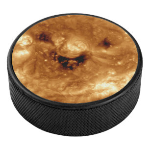 Smiling Sun From NASA Solar Observatory Hockey Puck