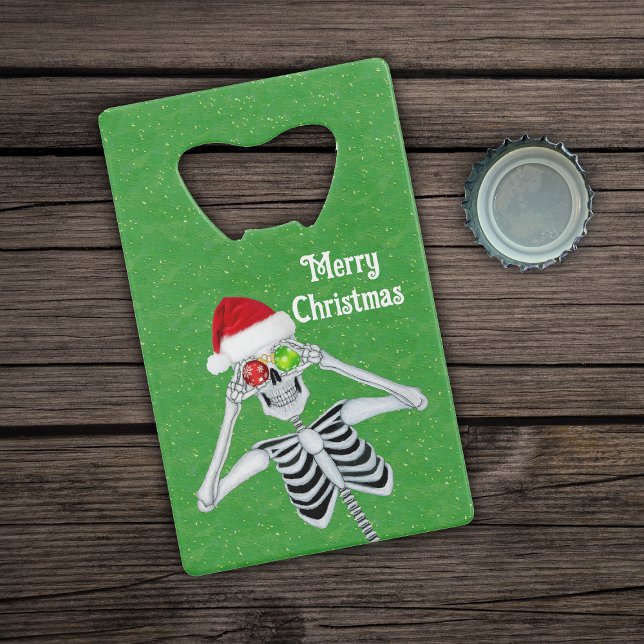 Smiling XMas Skeleton Santa Hat Ornaments Green (Smiling Merry Christmas Skeleton Ornament on green card bottle opener.)
