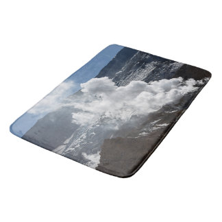 Smoking fumarole in crater of active volcano bath mat