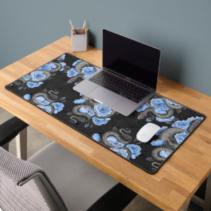 Snakes and blue roses desk mat