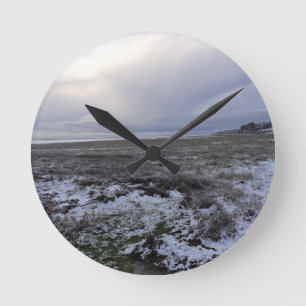 Snow Across The Bay Round Clock