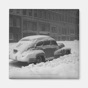 Snow capped car on street B&W Magnet