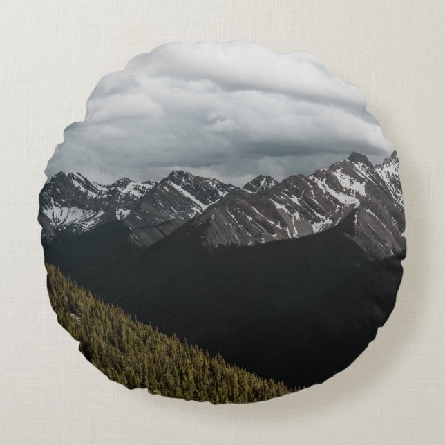 SNOW-CAPPED GRAY ROCKY MOUNTAIN UNDER CLOUDY SKY D ROUND CUSHION (Front)