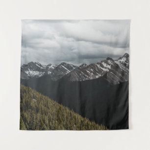 SNOW-CAPPED GRAY ROCKY MOUNTAIN UNDER CLOUDY SKY D TAPESTRY